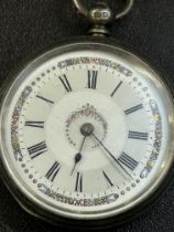 Silver victorian fob watch with key