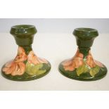 Pair of Moorcroft dwarf candlesticks