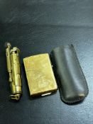 Trench art cigarette lighter and a brass Malboro l