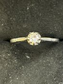 White metal possibly platinum ring set with solita