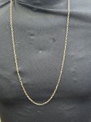 Large yellow metal chain tested for high carat gol