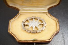 Case vintage silver brooch
