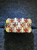 9ct Gold ring set with 10 garnets Size N Weight 5.