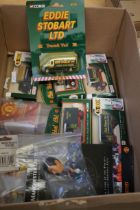 Box of model vehicles & football figures