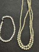 Stimulated pearl necklace with silver clasp & stim