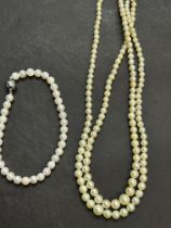 Stimulated pearl necklace with silver clasp & stim