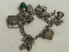 Silver charm bracelet - 11 charms