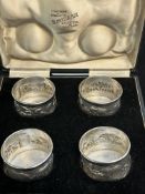 Set of 4 sterling silver napkin rings in fitted bo