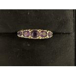 9ct Gold ring set with 5 Amethyst stones Size Q 2.