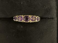 9ct Gold ring set with 5 Amethyst stones Size Q 2.