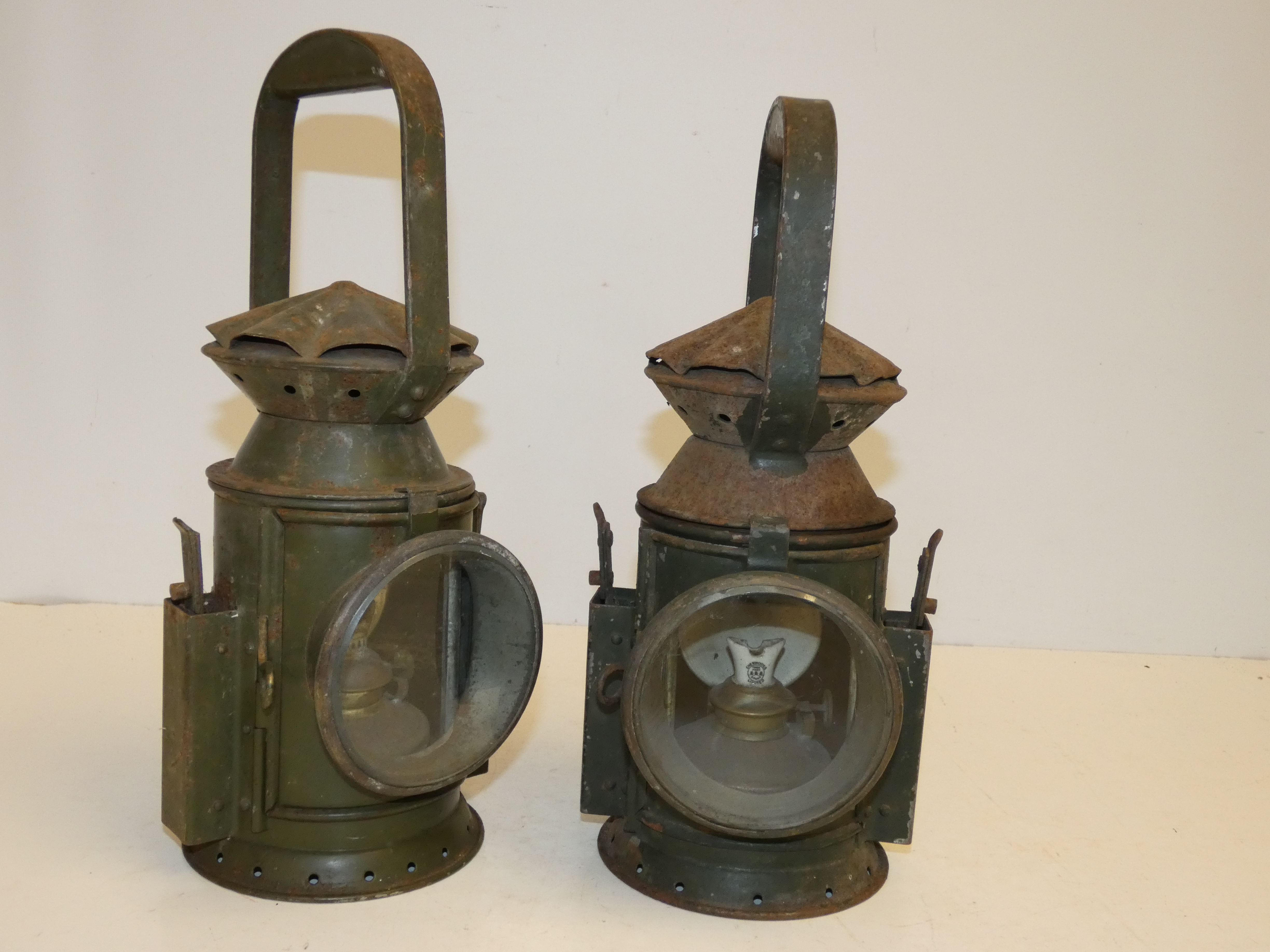 2x Military lanterns , 1 dated 1943 with crowns fo