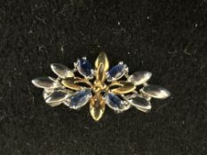 9ct Gold brooch set with 4 sapphire stones 2.3g