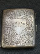 Silver cigarette case inscribed Alice to Bob 27th