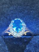 9ct Gold ring set with blue topaz & diamonds Size