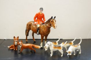 Beswick huntsman with 4 hounds & 2 foxes