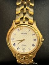 Seiko SQ100 wristwatch with box & papers