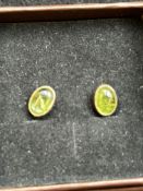 Pair of silver peridot earrings