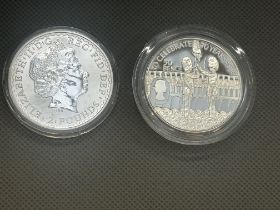 Britannia 1oz fine silver 2 pound coin together wi