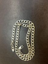 Silver gents curb chain Length 22inches Weight 62g