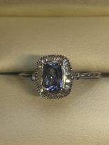 Premium tanzanite & white diamond ring in platinum