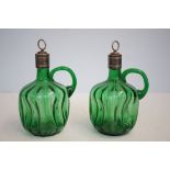 Pair of decanters with white metal rims