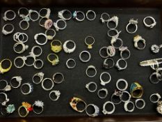 Approx 60 dress rings - some silver, some stamped
