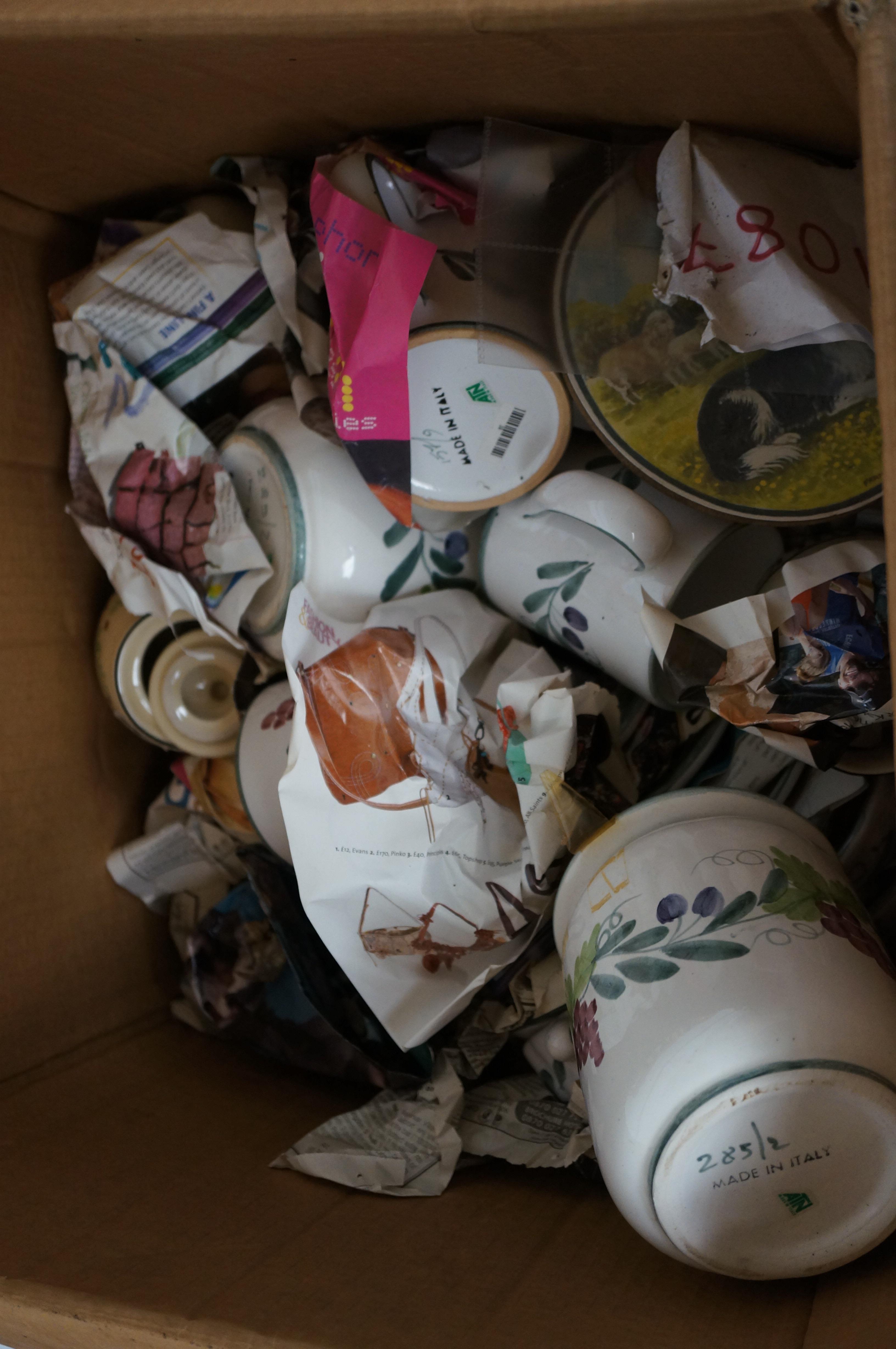 Unsorted box of ceramics