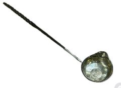 Unmarked silver toddy ladle with whale jaw handle,