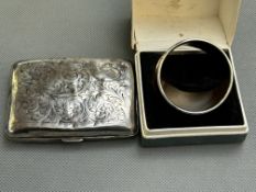Silver cigarette case bruised together with a silv