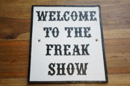 Cast iron welcome to the freak show sign