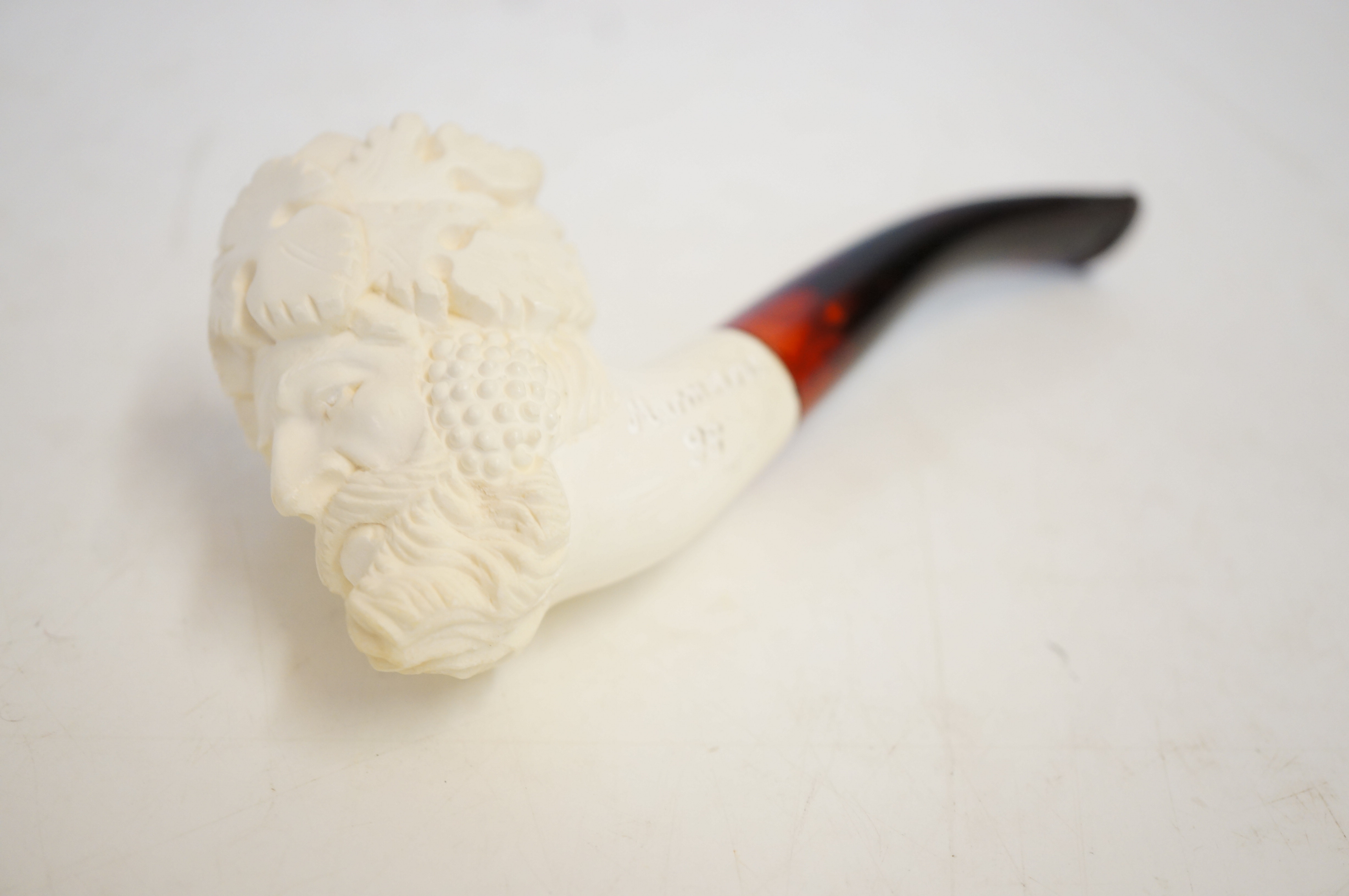 Carved Baccus smokers pipe