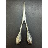 Pair of silver handled glove stretchers