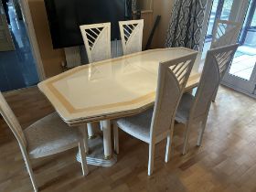 Large dining table with 6 chairs. Excellent qualit