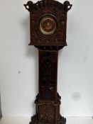 Carved miniature grandfather clock