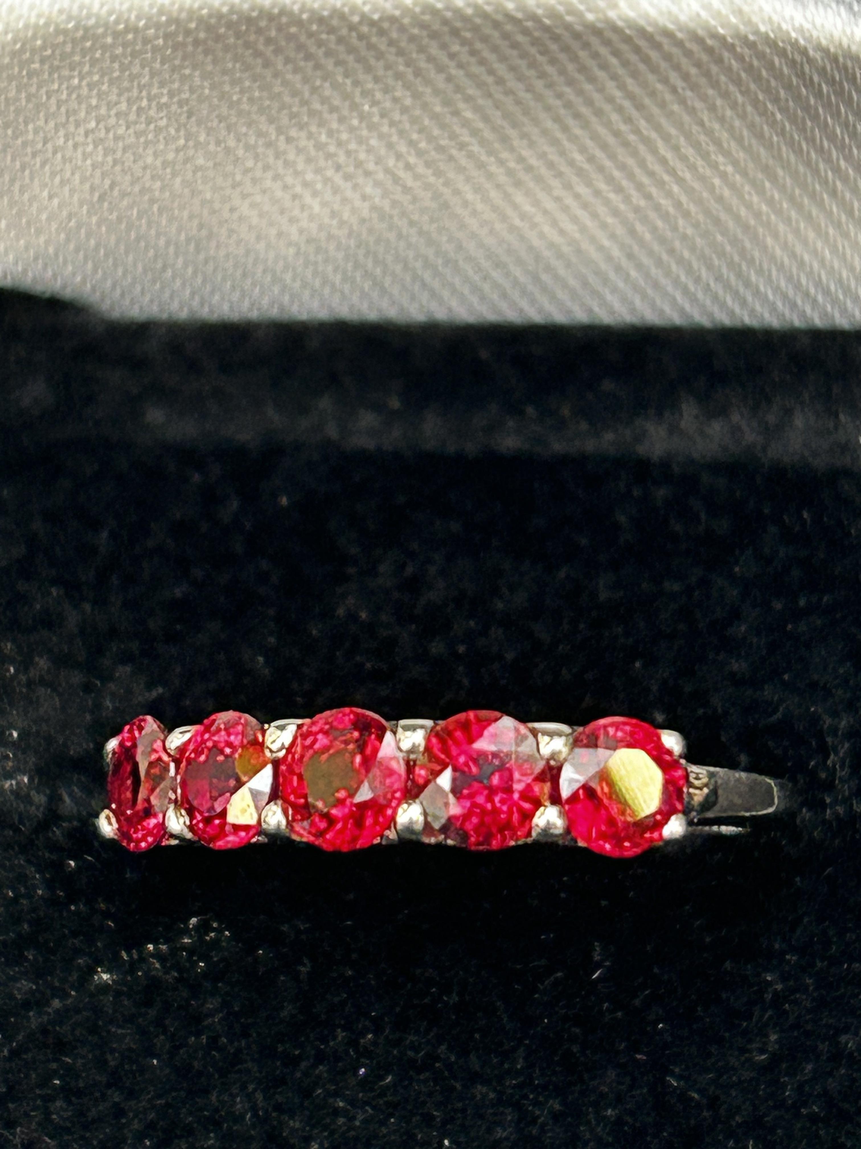 9ct White gold ring set with 5 garnets Size O 2g