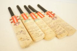 Collection of miniature hand signed cricket bats