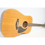 Marina acoustic guitar with soft case