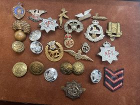 Collection of military buttons, cat badges and oth