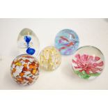 Five art glass paperweight