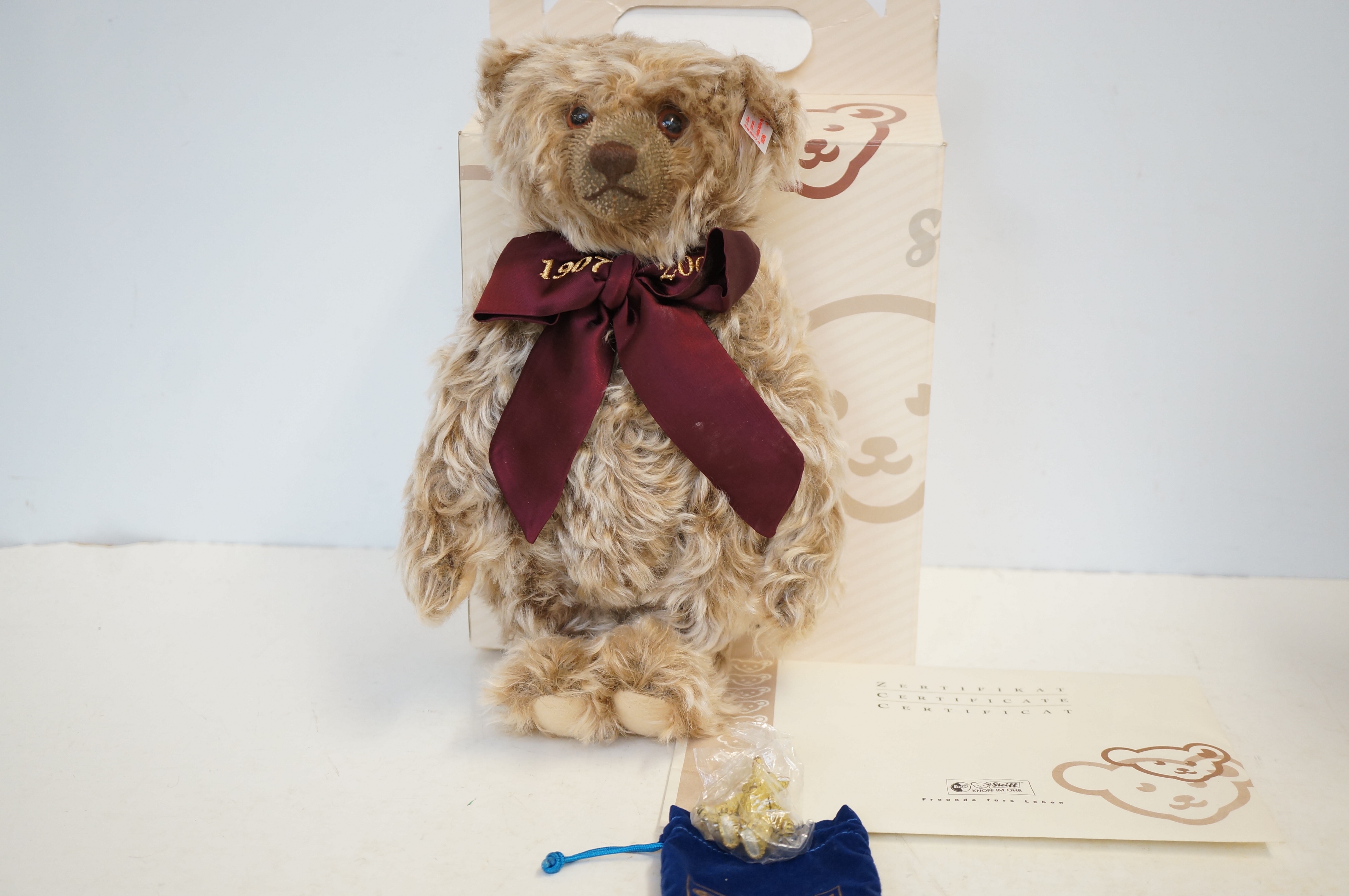 Steiff bear with original box, COA & metal bear