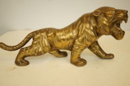 Large brass model of a tiger, 42cm long