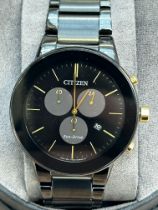 Citizen eco drive wristwatch with box & papers AT2