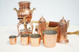 Collection of early copper measuring cups, heavy g