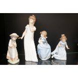 Four Nao child figurines