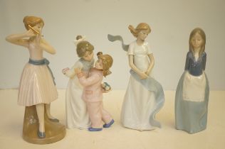 Three Nao child figures plus one other