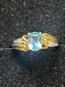 9ct gold ring set with diamond & blue topaz. Size