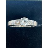 9ct White gold ring set with white sapphire & 2 di