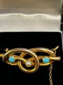 Unmarked yellow metal pin brooch set with turquois
