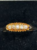 18ct Gold ring set with 5 diamonds, chester hallma