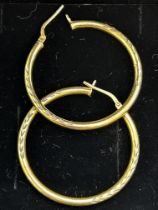 Pair of 9ct gold hoop earrings Weight 3.7g